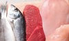 fish laying next to raw red meat an chicken
